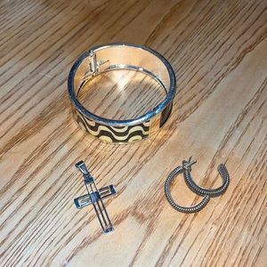 Set of jewelry including cross pendant, earrings, and a bracelet.